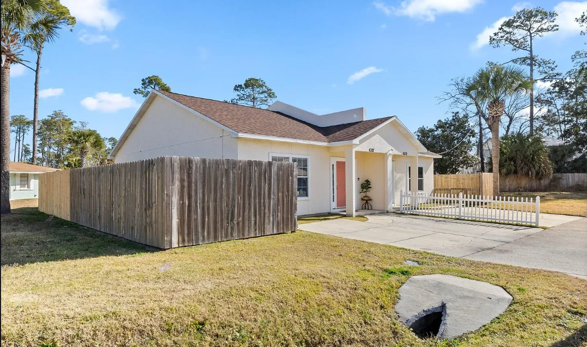 The exterior of the Poinciana Drive homes